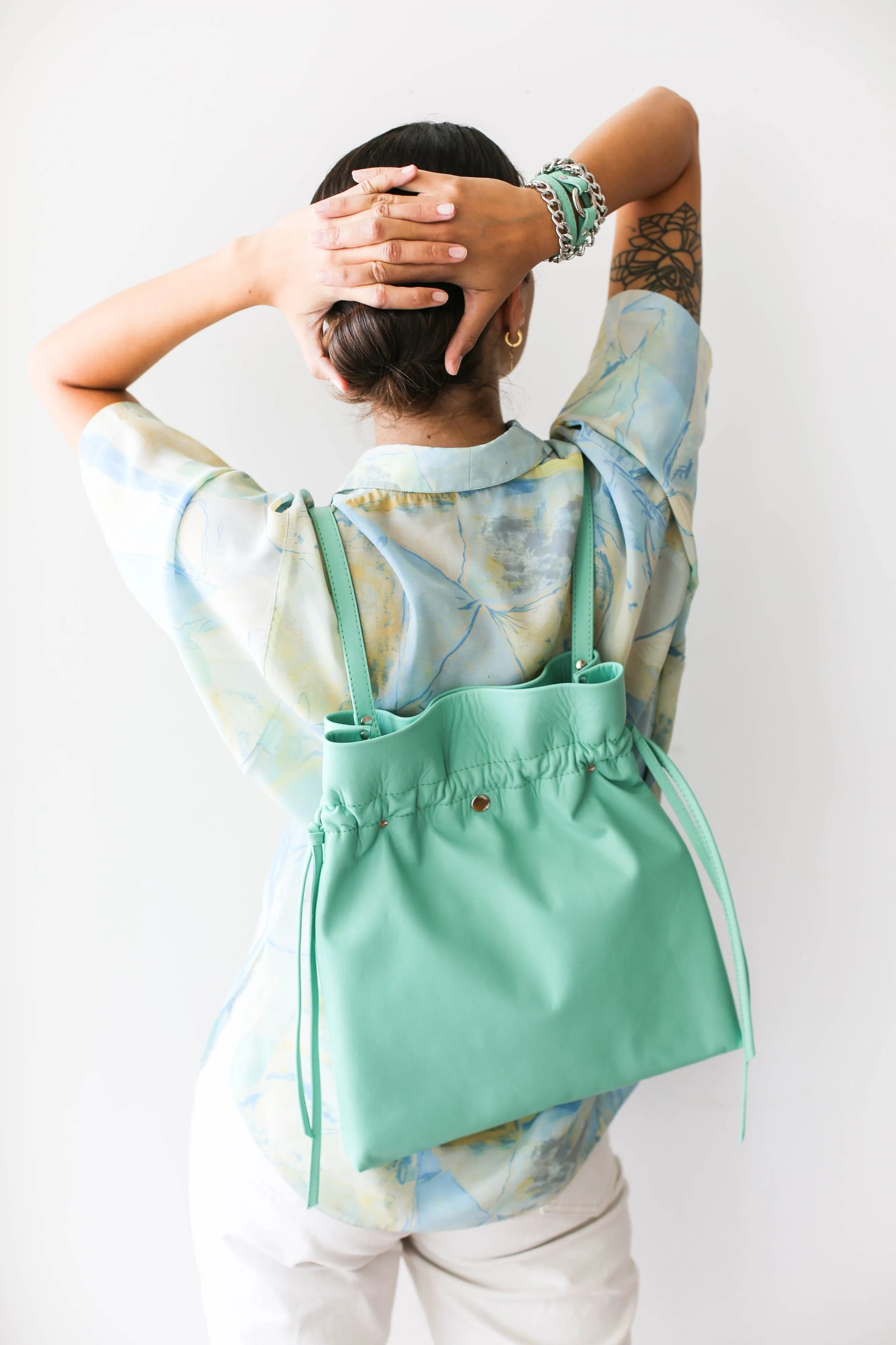 Turquoise Leather Drawstring Backpack