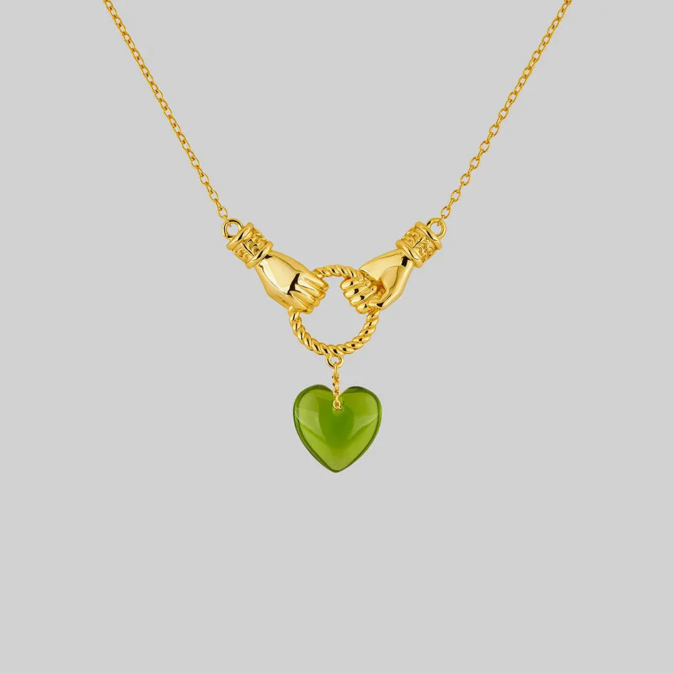 UNITE. Hand Grasping Green Glass Heart Necklace - Gold