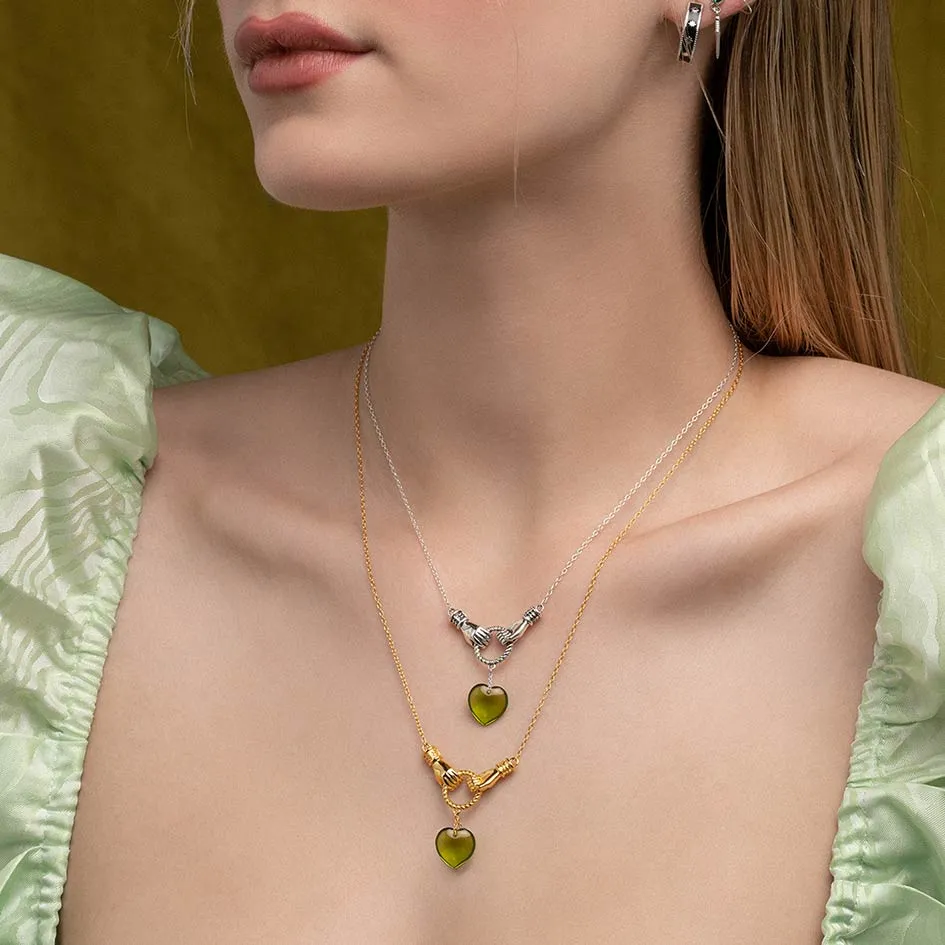 UNITE. Hand Grasping Green Glass Heart Necklace - Gold